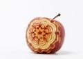 Apple carved by angkana neumayer Royalty Free Stock Photo